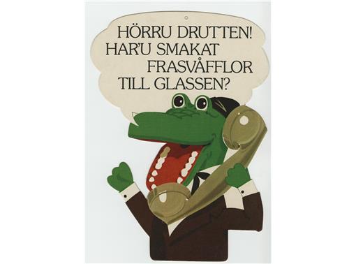 Drutten var från början en sovjetisk barnboksfigur som tillsammans med sin vän Gena dök upp i det svenska tv-programmet Sveriges magasin 1975 och blev mäkta populär. Här gör Drutten 1976 reklam för glass till frasvåfflor, det är reklam som ska exponeras i dagligvaruhandeln.